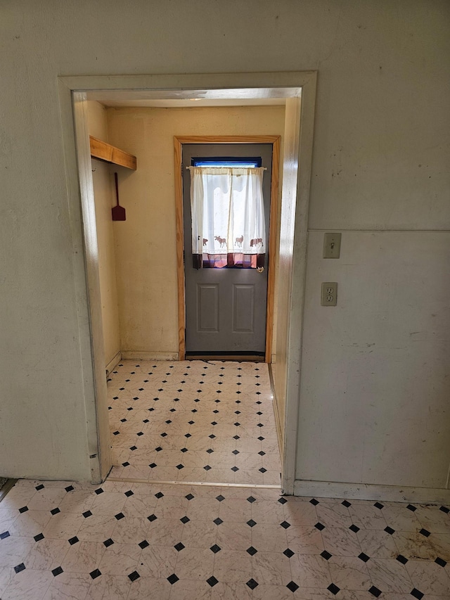 213 Harrison Ave N, Mentor, MN 56736 - doorway to outside featuring tile patterned floors