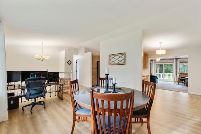 18799 147th St NW, Elk River, MN 55330 - dining area with an office area, light wood-type flooring, and a chandelier