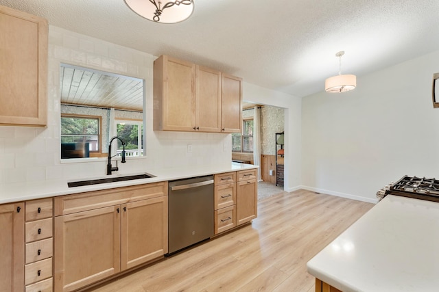 18799 147th St NW, Elk River, MN 55330 - kitchen with stainless steel appliances, light brown cabinets, a sink, light wood finished floors, and backsplash
