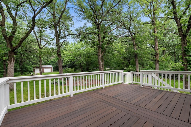 18799 147th St NW, Elk River, MN 55330 - wooden terrace with an outdoor structure and a lawn
