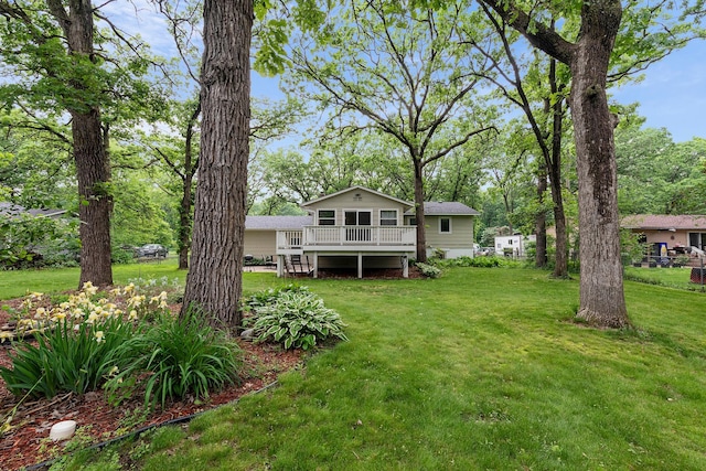 18799 147th St NW, Elk River, MN 55330 - view of grassy yard with a wooden deck