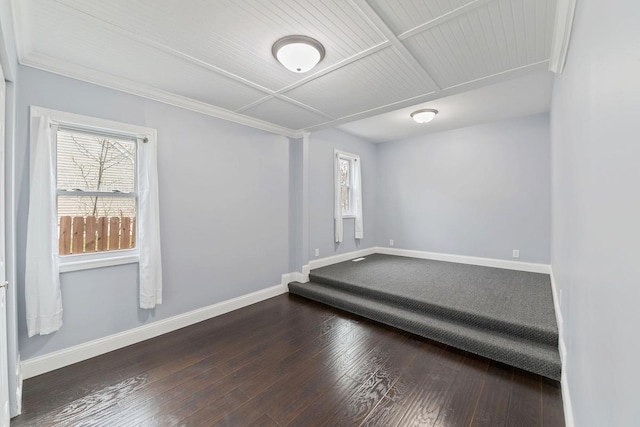 724 1st Ave NW, New Brighton, MN 55112 - unfurnished room featuring plenty of natural light, baseboards, wood-type flooring, and ornamental molding