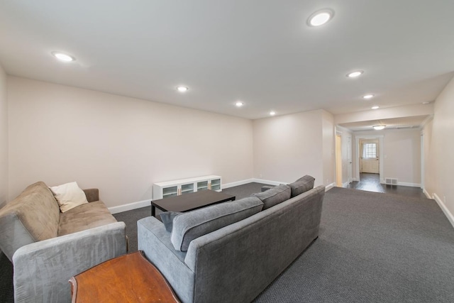724 1st Ave NW, New Brighton, MN 55112 - living area with dark carpet, baseboards, and recessed lighting