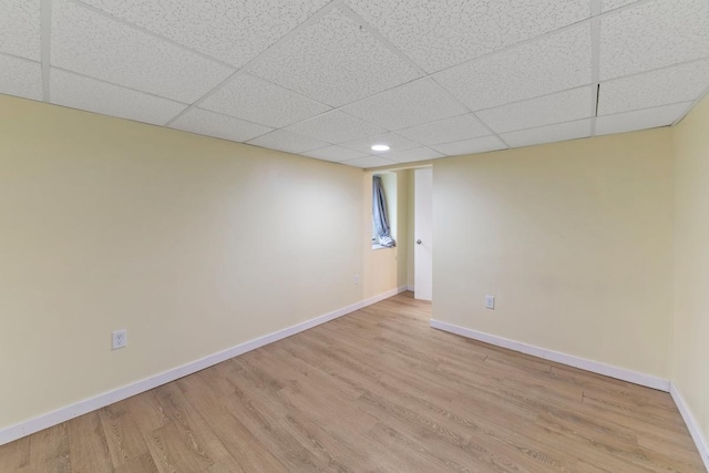 724 1st Ave NW, New Brighton, MN 55112 - spare room featuring light wood-type flooring, baseboards, a drop ceiling, and recessed lighting