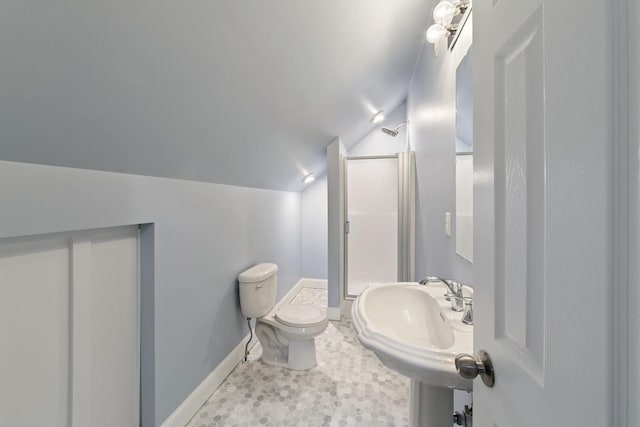 724 1st Ave NW, New Brighton, MN 55112 - bathroom with lofted ceiling, a stall shower, baseboards, toilet, and a sink