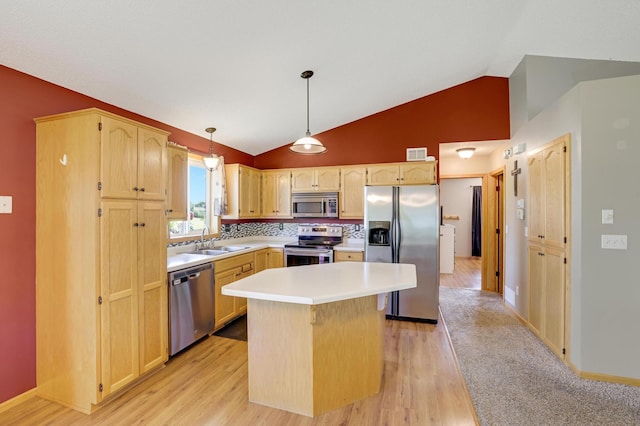 12966 Carole Dr, Becker, MN 55308 - kitchen featuring stainless steel appliances, light countertops, light wood-style flooring, a kitchen island, and light brown cabinets