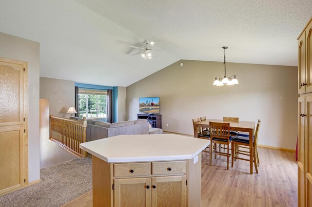 12966 Carole Dr, Becker, MN 55308 - kitchen featuring light wood-style floors, ceiling fan, open floor plan, a chandelier, and light brown cabinetry