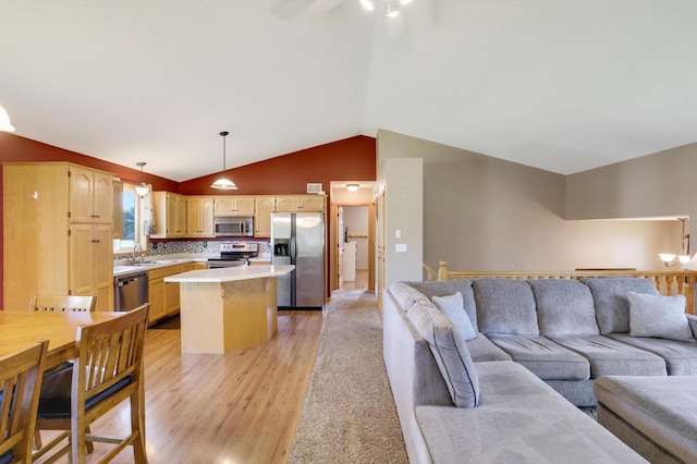 12966 Carole Dr, Becker, MN 55308 - living area with lofted ceiling, light wood-style flooring, and a ceiling fan
