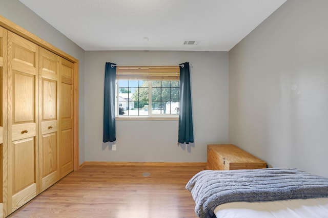 12966 Carole Dr, Becker, MN 55308 - bedroom featuring light wood-style floors and a closet