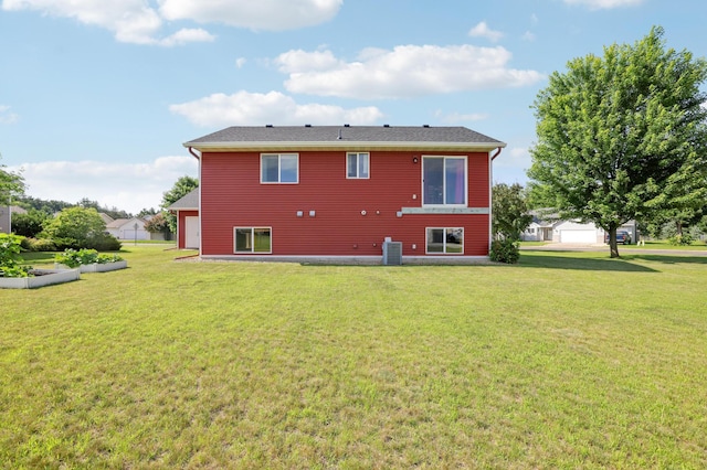 12966 Carole Dr, Becker, MN 55308 - back of house with a yard and a garage