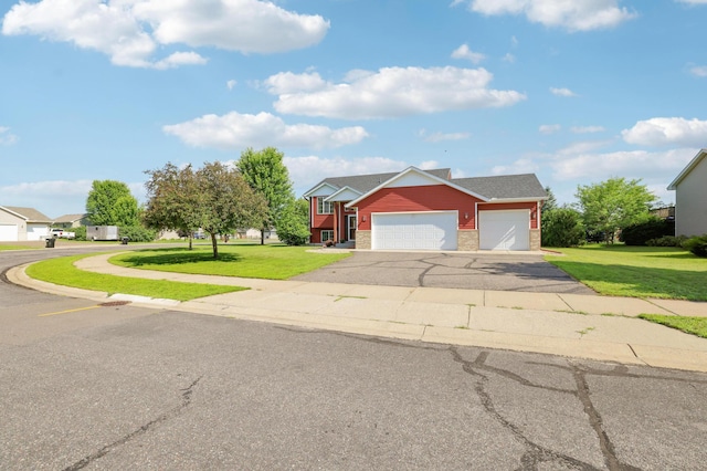 12966 Carole Dr, Becker, MN 55308 - traditional home with an attached garage, a front yard, driveway, and brick siding