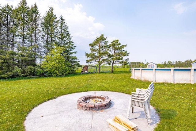 2541 County Road 4, Carlton, MN 55718 - view of patio / terrace featuring a fire pit and an outdoor pool