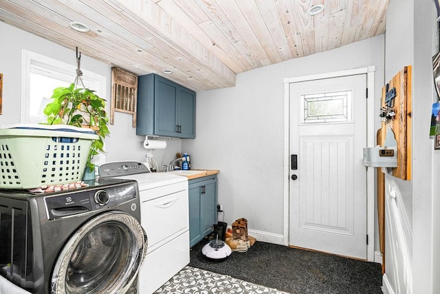 2541 County Road 4, Carlton, MN 55718 - laundry area with cabinet space, washer and dryer, wood ceiling, and baseboards