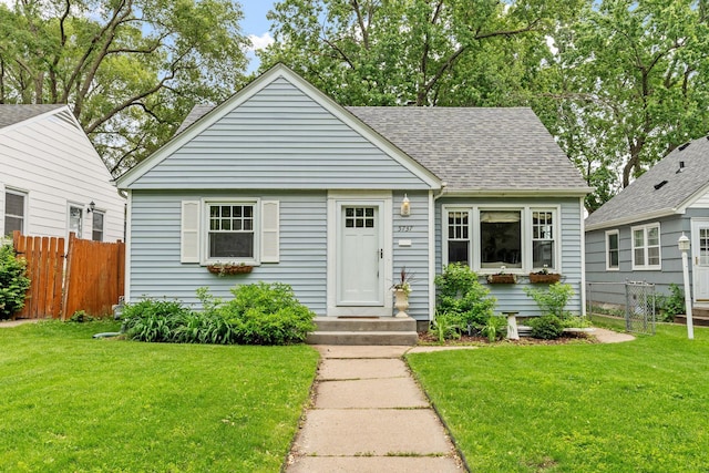 5737 Vincent Ave S, Minneapolis, MN 55410 - bungalow-style home with a shingled roof