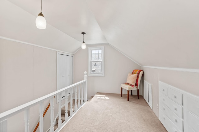 5737 Vincent Ave S, Minneapolis, MN 55410 - living area with lofted ceiling, carpet flooring, and an upstairs landing