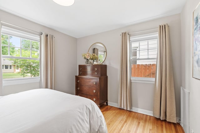 5737 Vincent Ave S, Minneapolis, MN 55410 - bedroom with light wood-type flooring and baseboards