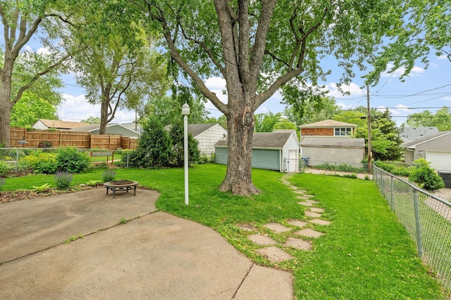 5737 Vincent Ave S, Minneapolis, MN 55410 - view of yard featuring a fire pit and a patio