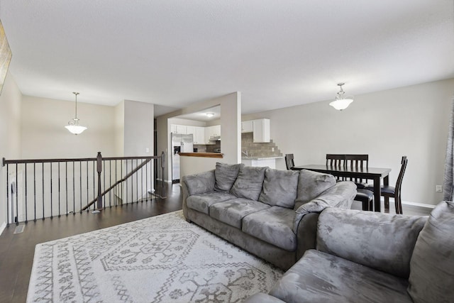 7511 Zinnia Way, Maple Grove, MN 55311 - living room featuring dark wood finished floors and baseboards