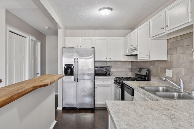 7511 Zinnia Way, Maple Grove, MN 55311 - kitchen with appliances with stainless steel finishes, a sink, under cabinet range hood, butcher block counters, and a textured ceiling