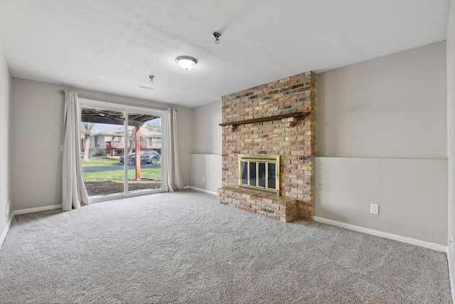 7511 Zinnia Way, Maple Grove, MN 55311 - unfurnished living room with carpet floors, baseboards, a textured ceiling, and a fireplace