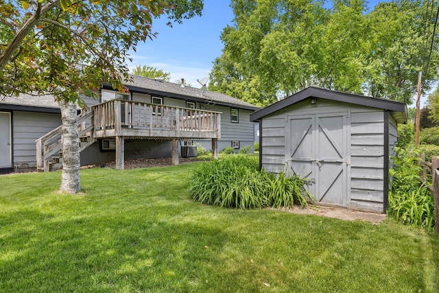 3932 Louisiana Ave N, New Hope, MN 55427 - back of house with a deck, a yard, central AC, stairs, and a shingled roof