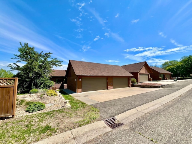 1319 3rd St, Red Wing, MN 55066 - view of front of property with roof with shingles and an attached garage
