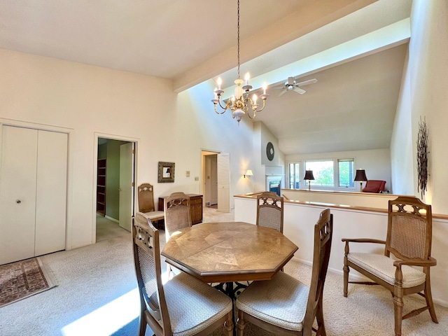 1319 3rd St, Red Wing, MN 55066 - dining space with light carpet, a chandelier, beam ceiling, a ceiling fan, and high vaulted ceiling