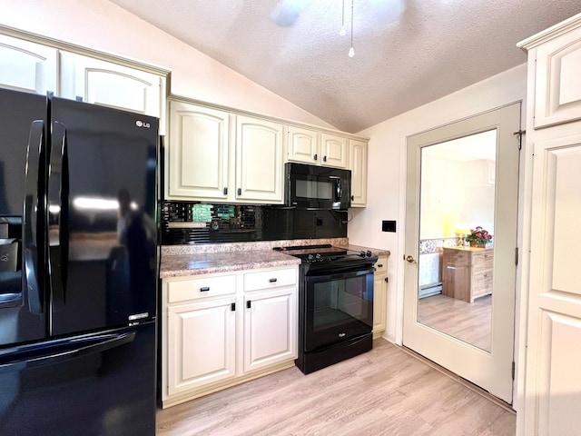 1319 3rd St, Red Wing, MN 55066 - kitchen with black appliances, lofted ceiling, light wood-type flooring, a textured ceiling, and a baseboard radiator