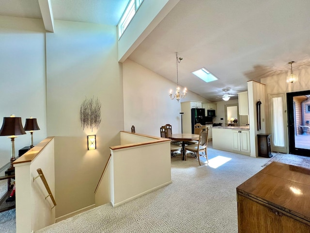1319 3rd St, Red Wing, MN 55066 - office with a skylight, light colored carpet, a chandelier, and lofted ceiling