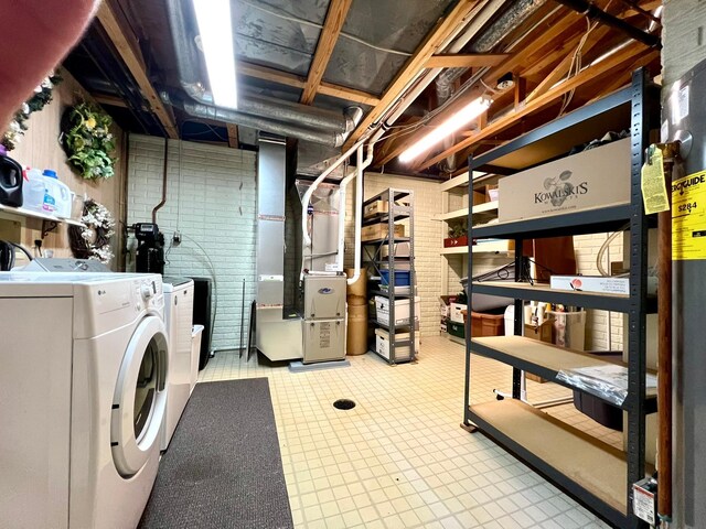 1319 3rd St, Red Wing, MN 55066 - unfinished basement featuring washer and clothes dryer and heating unit