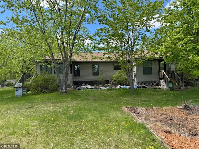 26612 State Highway 47, Aitkin, MN 56431 - rear view of property with a lawn