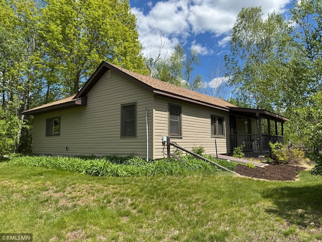 26612 State Highway 47, Aitkin, MN 56431 - view of side of home with a yard