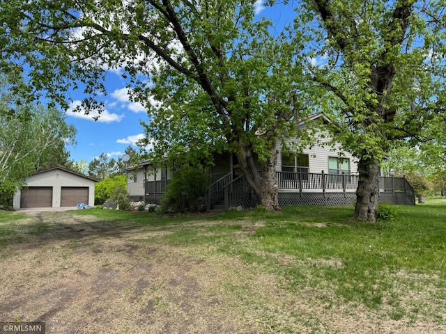 26612 State Highway 47, Aitkin, MN 56431 - view of grassy yard featuring an outbuilding and a detached garage