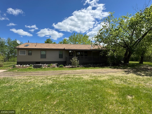26612 State Highway 47, Aitkin, MN 56431 - rear view of house with a lawn