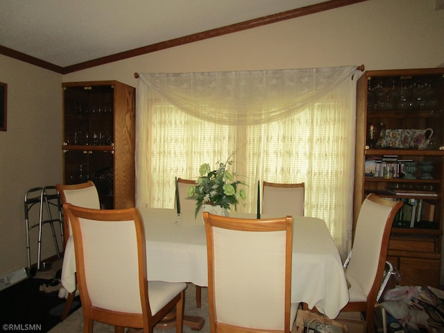 26612 State Highway 47, Aitkin, MN 56431 - dining room featuring vaulted ceiling and ornamental molding