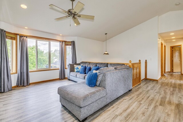 918 Mallard St NE, Hanover, MN 55341 - living area with vaulted ceiling, baseboards, light wood finished floors, a ceiling fan, and recessed lighting