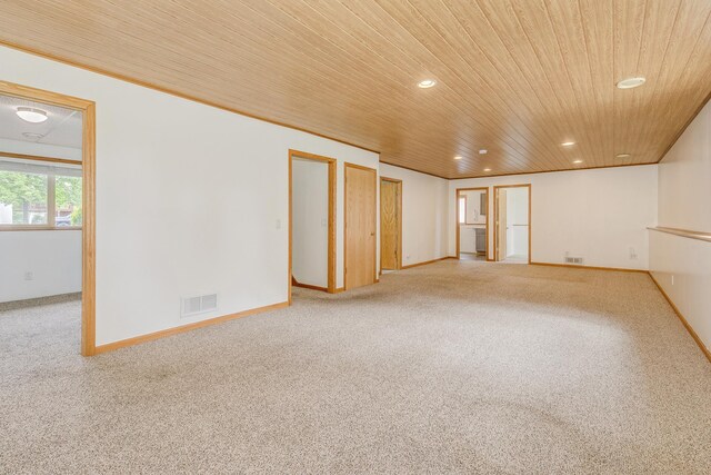 918 Mallard St NE, Hanover, MN 55341 - carpeted empty room with wooden ceiling, recessed lighting, and baseboards