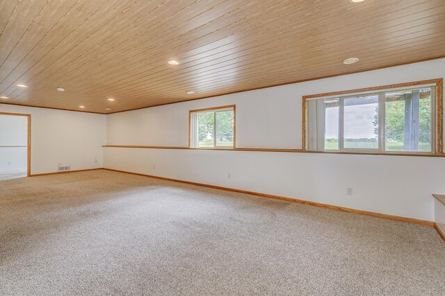 918 Mallard St NE, Hanover, MN 55341 - empty room with wood ceiling, carpet flooring, recessed lighting, and baseboards