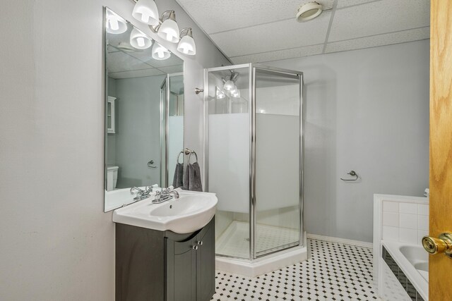 918 Mallard St NE, Hanover, MN 55341 - full bath with a paneled ceiling, vanity, a stall shower, toilet, and a bath