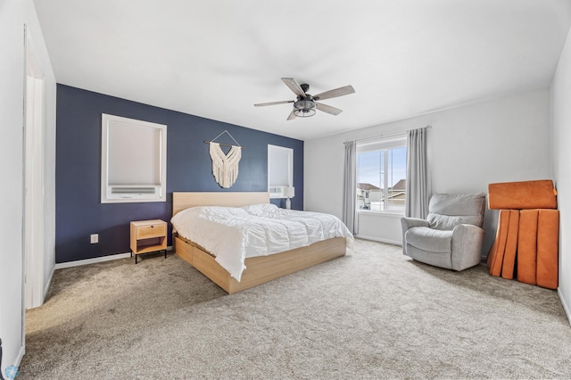 934 31st Ave W, West Fargo, ND 58078 - carpeted bedroom with a ceiling fan and baseboards