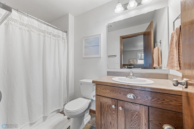934 31st Ave W, West Fargo, ND 58078 - full bathroom with toilet, vanity, and a shower with shower curtain