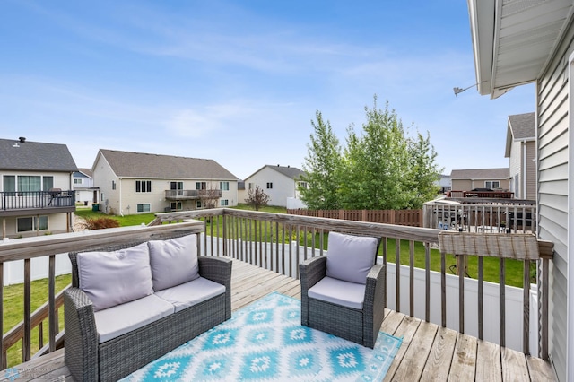 934 31st Ave W, West Fargo, ND 58078 - wooden deck featuring an outdoor living space and a residential view