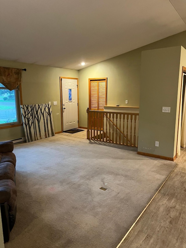 1602 8th Ave S, Saint Cloud, MN 56301 - entryway with recessed lighting, wood finished floors, and a baseboard heating unit