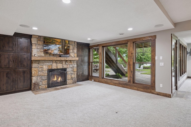 3920 Hawthorne Cir, Chanhassen, MN 55331 - unfurnished living room featuring carpet, a fireplace, recessed lighting, and baseboards