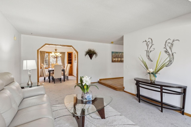 5929 Oxford St N, Shoreview, MN 55126 - living room featuring carpet, arched walkways, and a chandelier