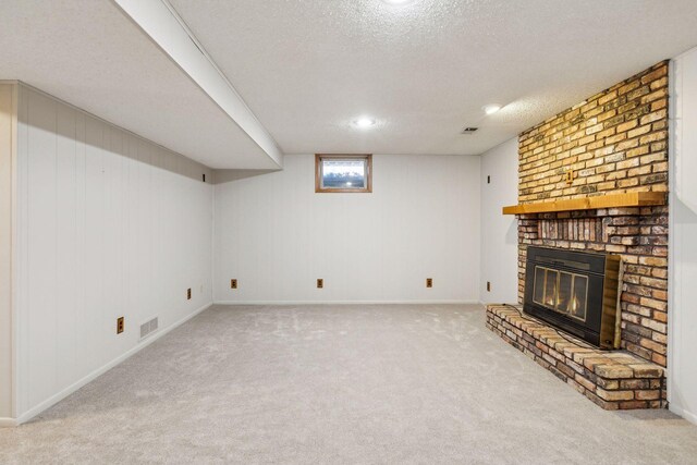 5929 Oxford St N, Shoreview, MN 55126 - unfurnished living room featuring a fireplace, carpet, and a textured ceiling