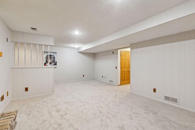 5929 Oxford St N, Shoreview, MN 55126 - finished below grade area with a textured ceiling and carpet floors