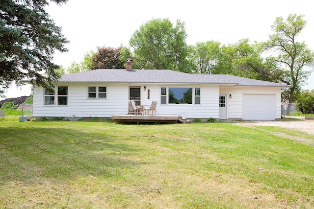 6014 6th St, Lake Park, MN 56554 - ranch-style home with a garage, driveway, a wooden deck, a front lawn, and a chimney