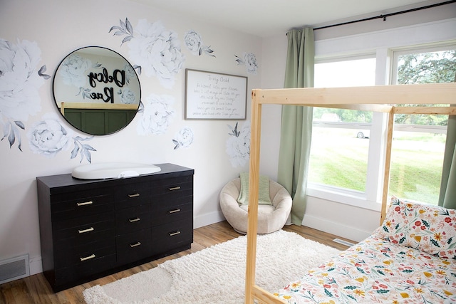 6014 6th St, Lake Park, MN 56554 - bedroom with wood finished floors, baseboards, and a sink