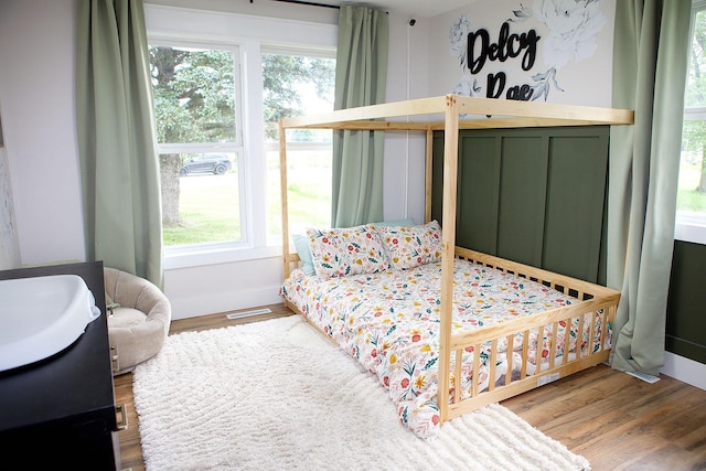 6014 6th St, Lake Park, MN 56554 - bedroom with wood finished floors
